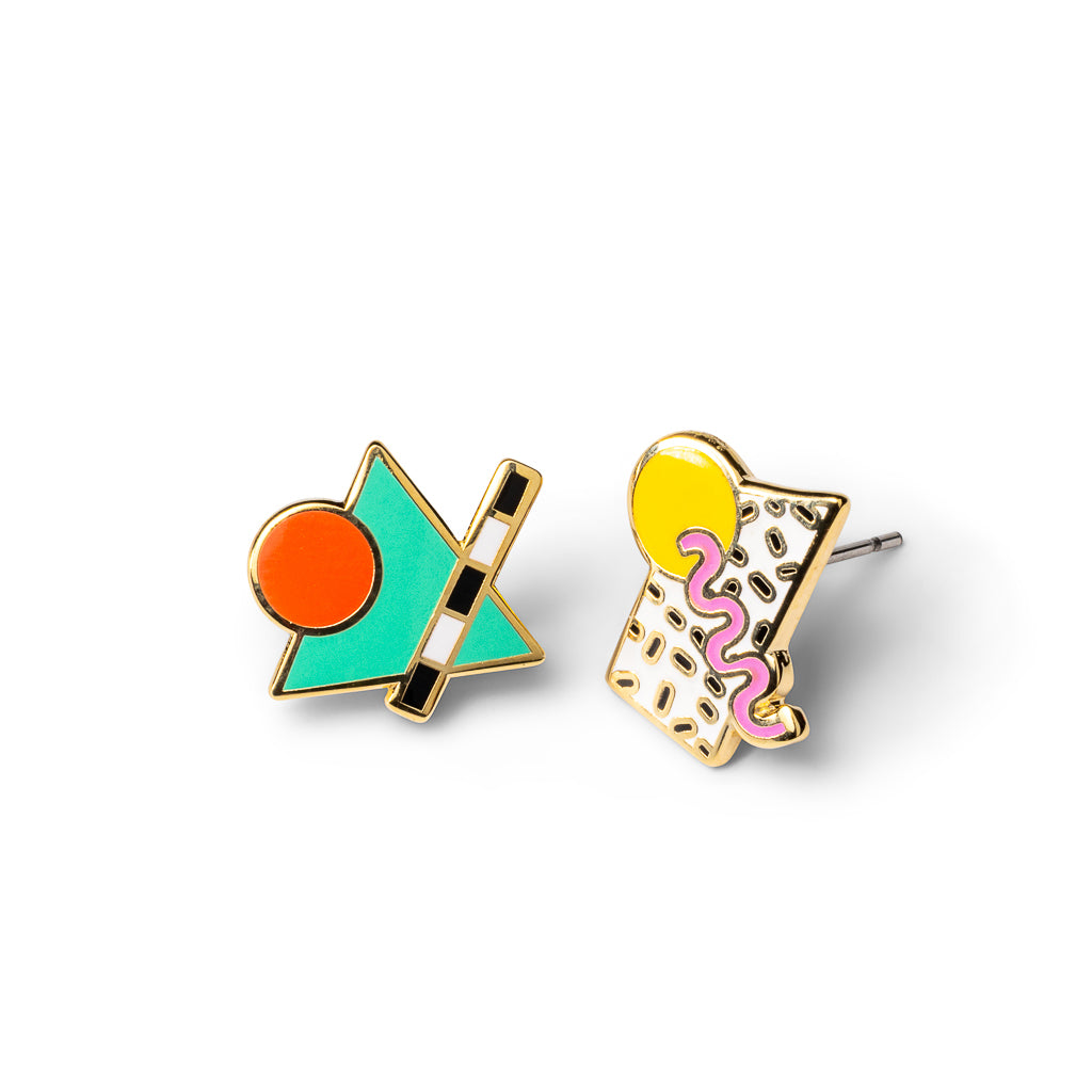 Mismatched cloisonné stud earrings featuring bold 80s geometric shapes in teal orange and pink gilded in 22 karat gold by Yellow Owl Workshop