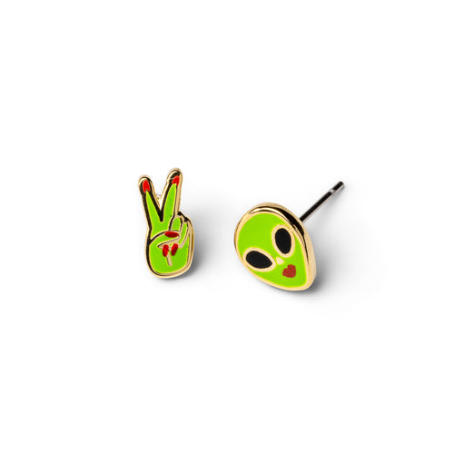 Mismatched cloisonné stud earrings featuring green peace sign hand and alien face  gilded in 22 karat gold by Yellow Owl Workshop