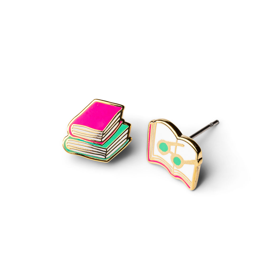 Mismatched gold stud earrings featuring stack of pink and green books and open book with reading glasses by Yellow Owl Workshop