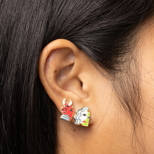 Cubist mismatched cloisonné stud earrings worn on ear by Yellow Owl Workshop