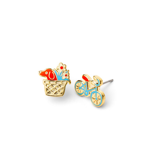 Mismatched bike and basket earrings featuring a bicycle design and a basket with a dog and flowers, in colorful enamel with gold-toned details.