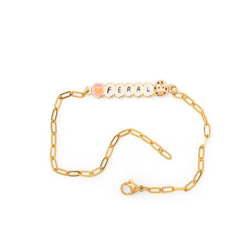 Gold paperclip chain Feral bracelet with enamel letter charms and pink heart and orange cat face unclasped on white background by Yellow Owl Workshop