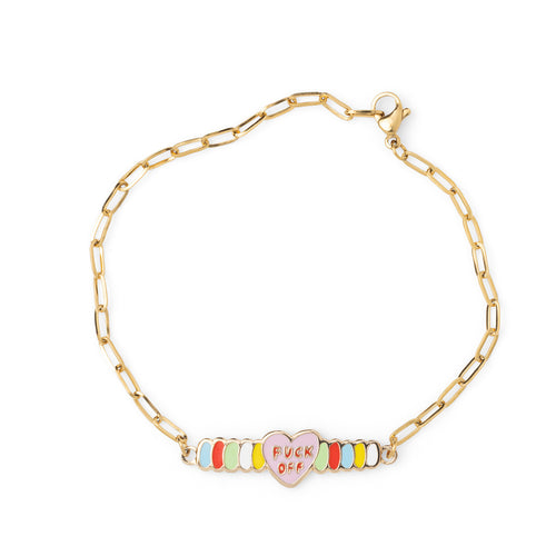 Pink enamel candy heart bracelet reading Fuck Off with colorful segments on gold paperclip chain by Yellow Owl Workshop