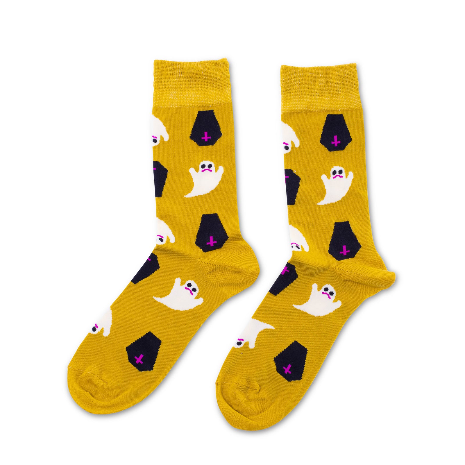 Golden yellow crew socks featuring illustrated sad ghosts and black coffins with pink crosses by Yellow Owl Workshop