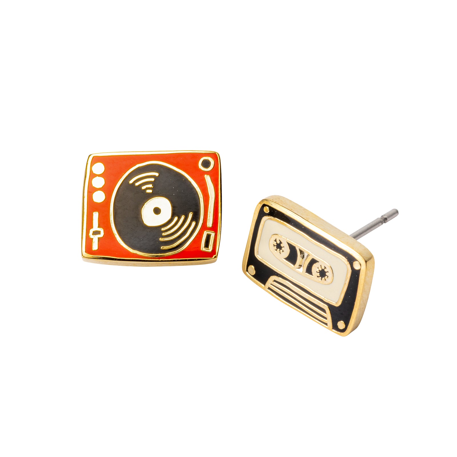 A pair of retro-themed stud earrings shaped like a vinyl record player and a cassette tape, featuring gold-tone metal borders and black and orange enamel details, set against a plain white background.