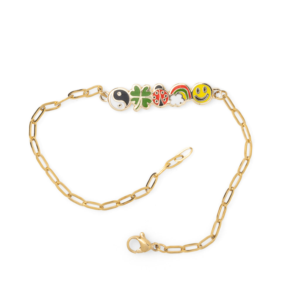 Gold paperclip chain Lucky Charms bracelet with five enamel charms unclasped on white background by Yellow Owl Workshop