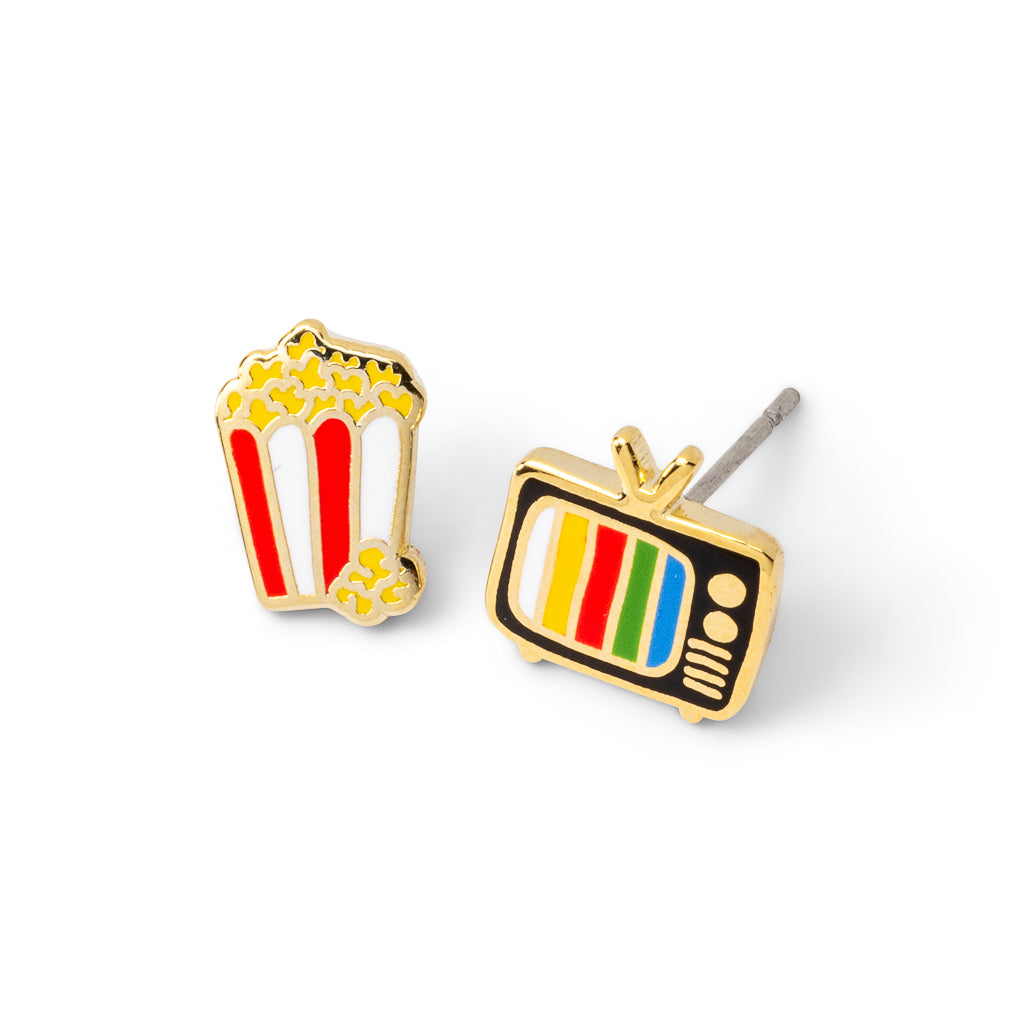 Mismatched cloisonné stud earrings featuring popcorn box and retro rainbow TV gilded in 22 karat gold by Yellow Owl Workshop