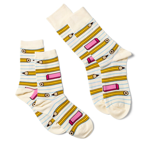 Pair of socks with pencil and eraser pattern on a white background