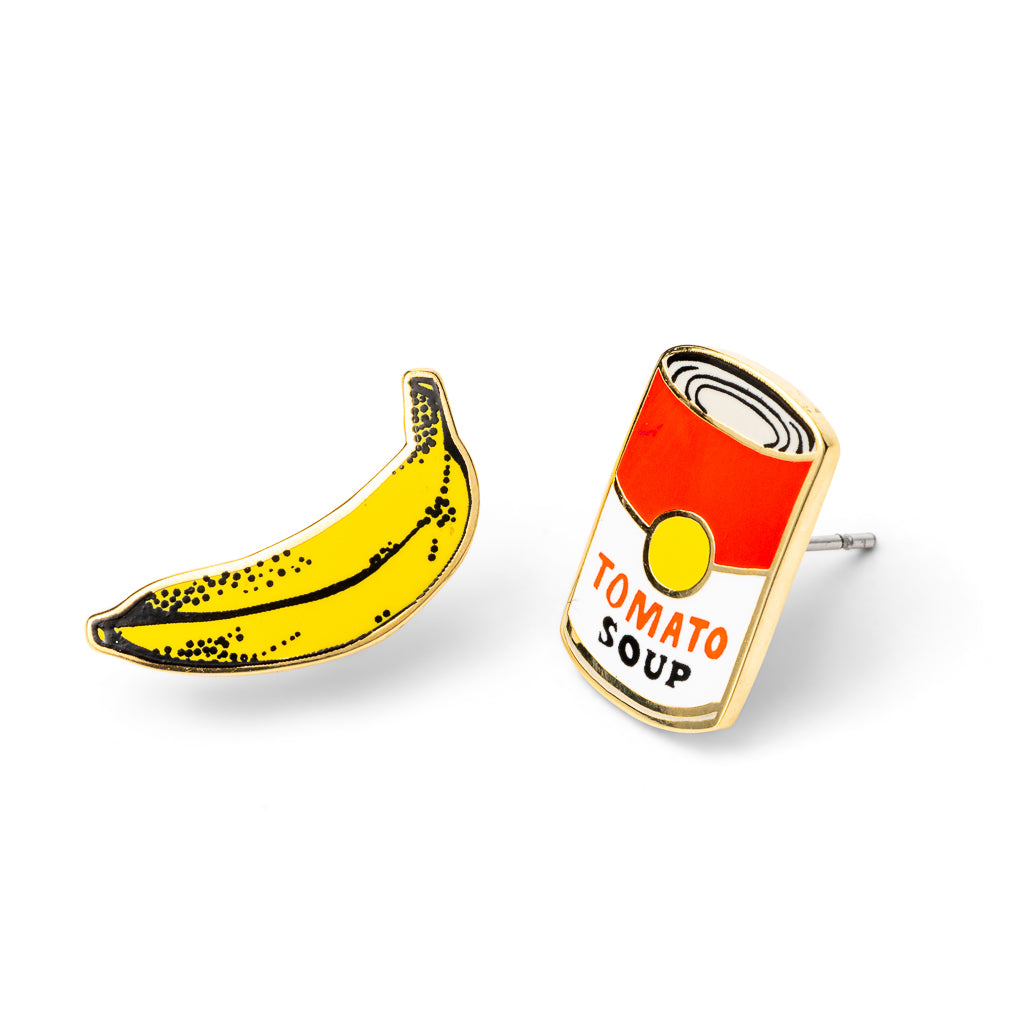 Mismatched gold stud earrings featuring Warhol-inspired yellow banana and red tomato soup can by Yellow Owl Workshop