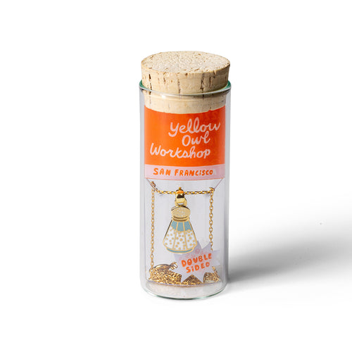 Salt and Pepper double-sided enamel pendant necklace in glass vial cork packaging by Yellow Owl Workshop