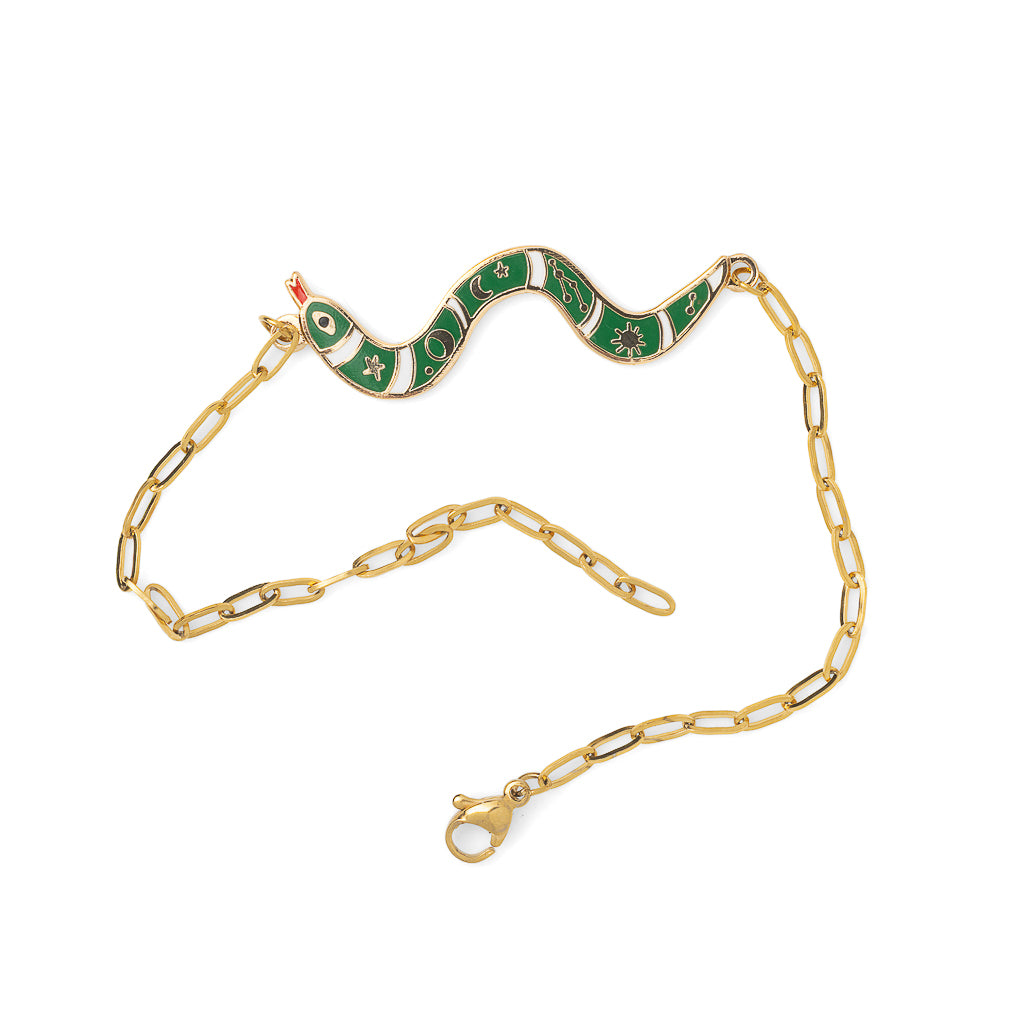 Green and white enamel snake charm bracelet with stars and moons detail unclasped on white background by Yellow Owl Workshop