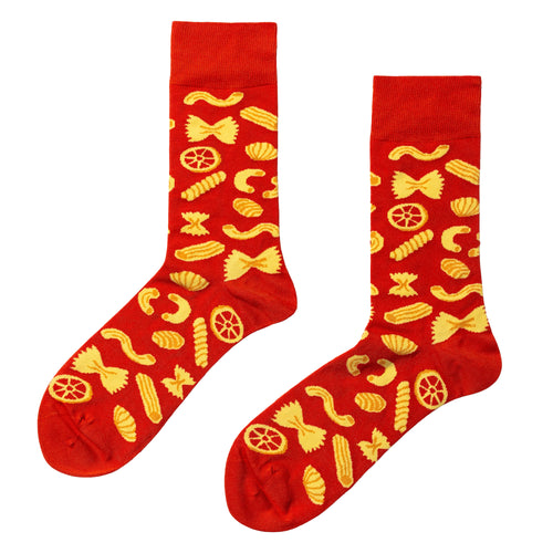 Red crew socks featuring illustrated pasta shapes including farfalle fusilli and rigatoni by Yellow Owl Workshop