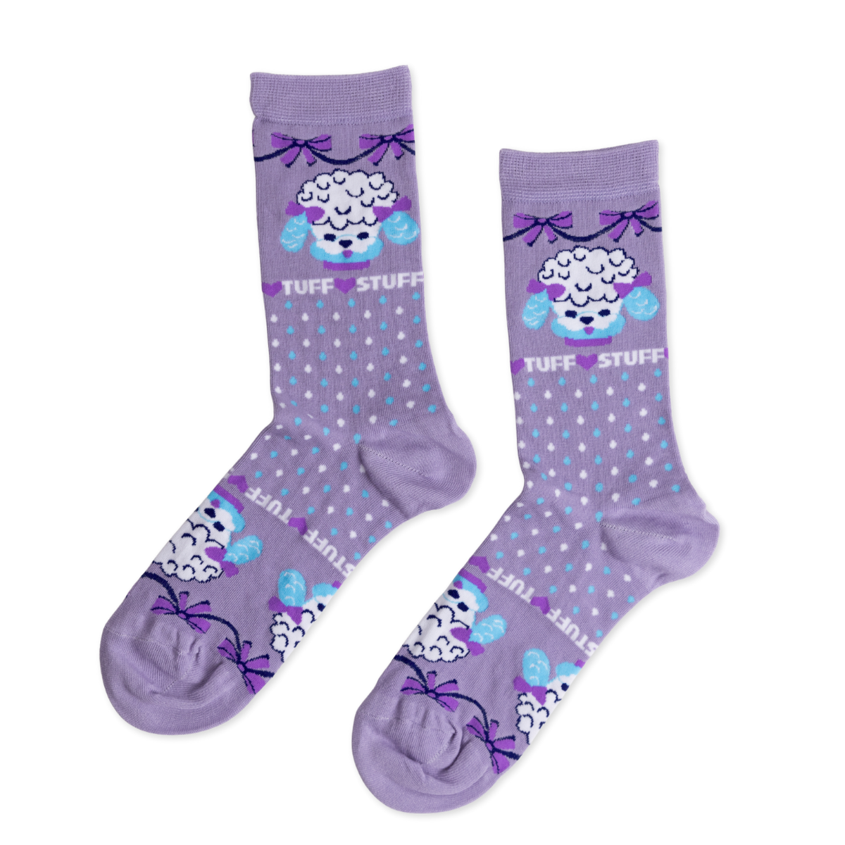 Lavender crew socks featuring illustrated poodles with bows and Tuff Stuff text on polka dot background by Yellow Owl Workshop