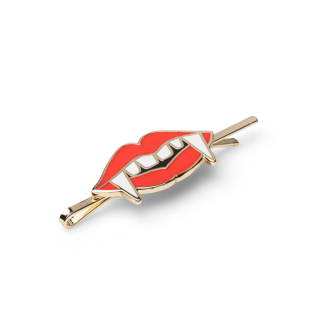 Gold cloisonné enamel vampire lips hair pin with blood-red lips and gold fangs by Yellow Owl Workshop
