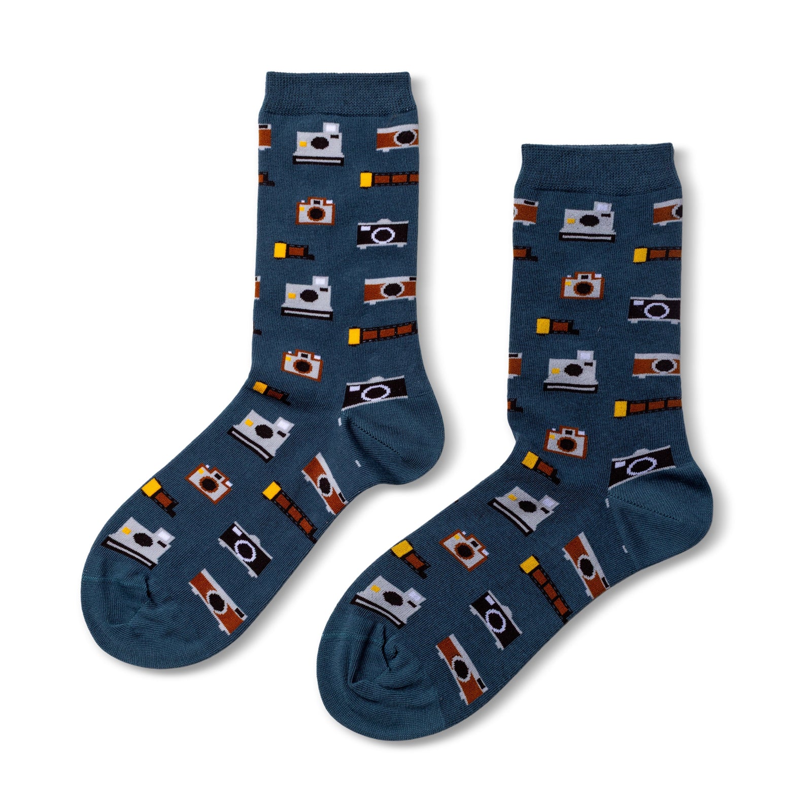 Blue crew socks featuring illustrated vintage cameras and film strips in brown black and white by Yellow Owl Workshop