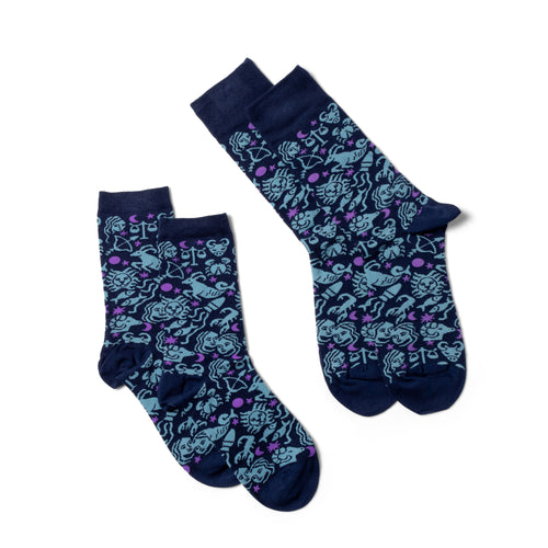 Zodiac crew socks small and large sizes laid out side by side by Yellow Owl Workshop