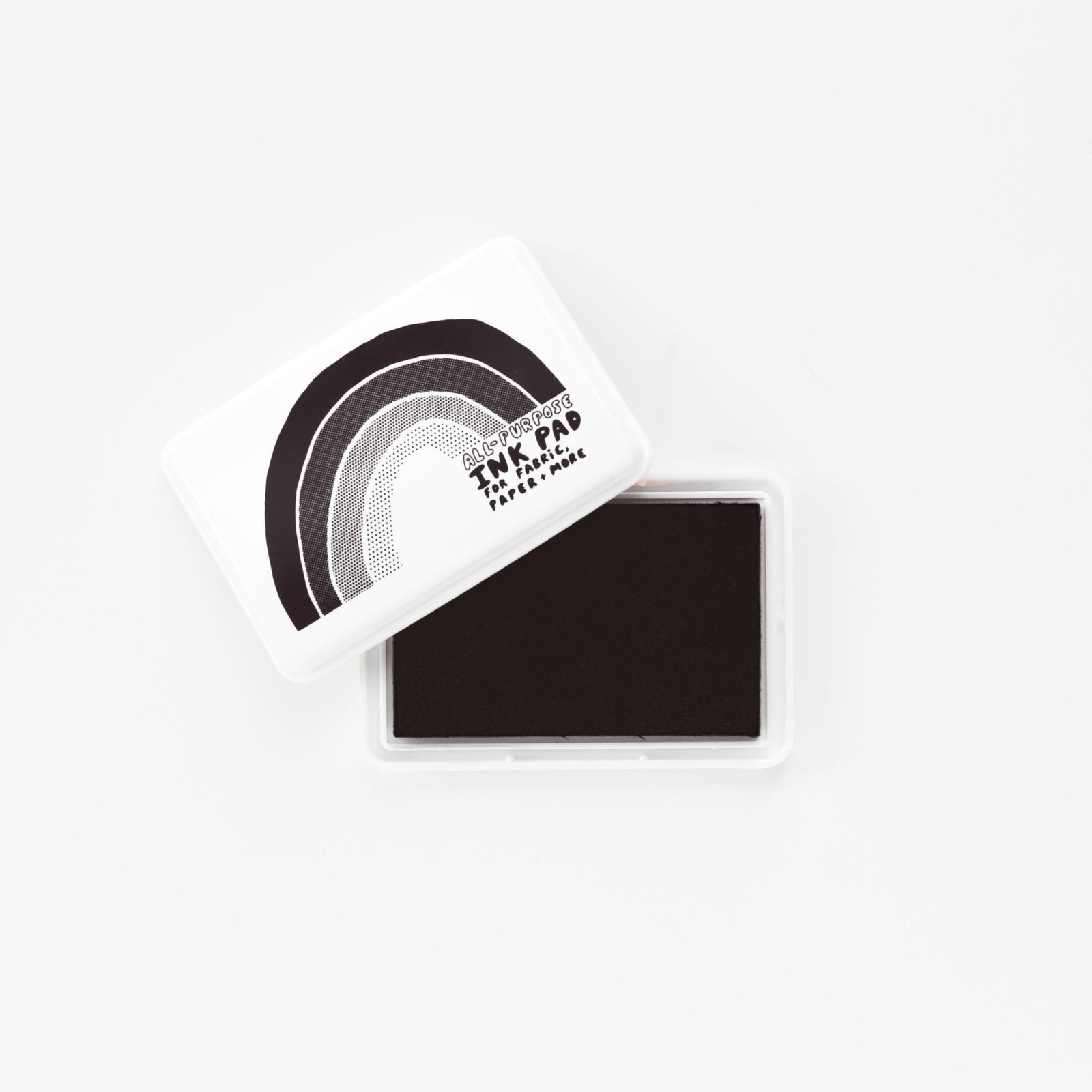 Black permanent waterproof all-purpose ink pad open showing black ink pad and white rainbow lid by Yellow Owl Workshop