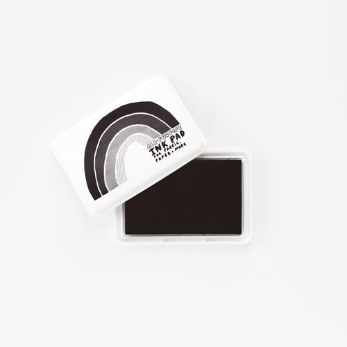 Black permanent waterproof all-purpose ink pad open showing black ink pad and white rainbow lid by Yellow Owl Workshop