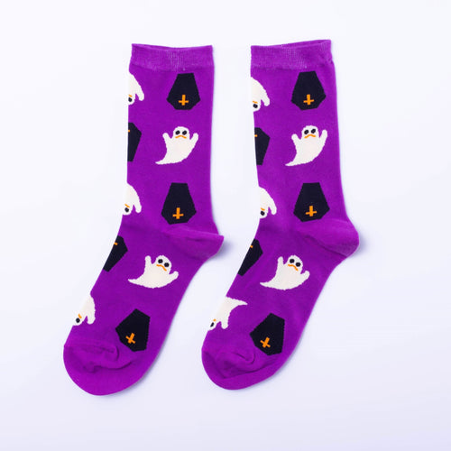 Purple crew socks featuring illustrated sad ghosts and black coffins with orange crosses by Yellow Owl Workshop