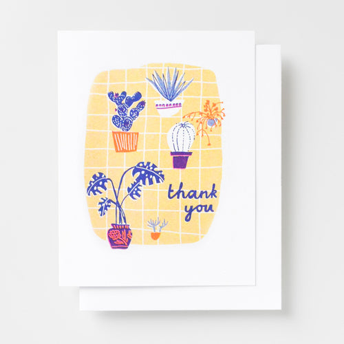 Risograph greeting card with illustrated potted plants including a cactus, agave, monstera, and succulents arranged on a yellow grid background, text reads thank you in navy cursive lettering