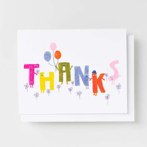 Risograph greeting card with illustrated letter characters each with a face spelling out THANKS in multicolor with balloons and flowers on a white background