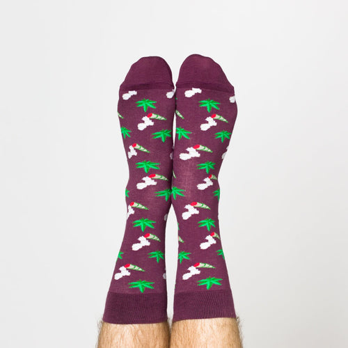 Purple Weed crew socks with cannabis leaf and joint print worn on feet by Yellow Owl Workshop